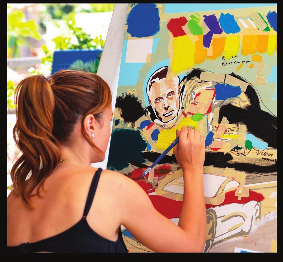 Elizabeth painting a commissioned portrait in her studio