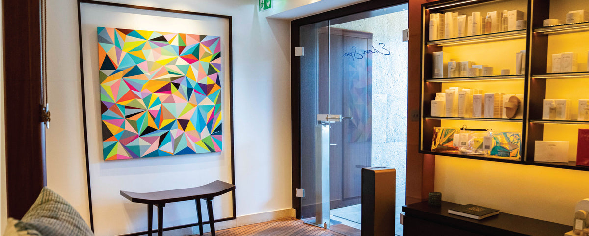 Bar interior with a geometric painting on the wall