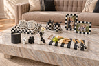 Dog lovers coffee table styled scene with checkerboard trays, bulldog figurines and striped board