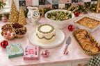 Christmas kitchen counter styled scene with gold serveware and holiday table decor