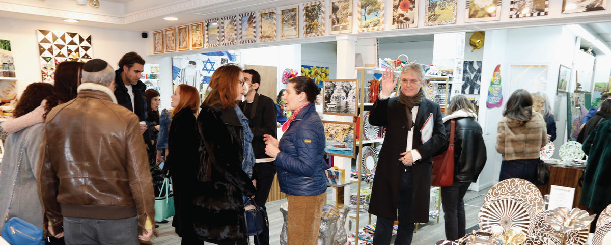 Guests browsing the atelier during an event