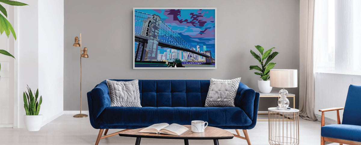 Living room with a navy sofa and a large painting