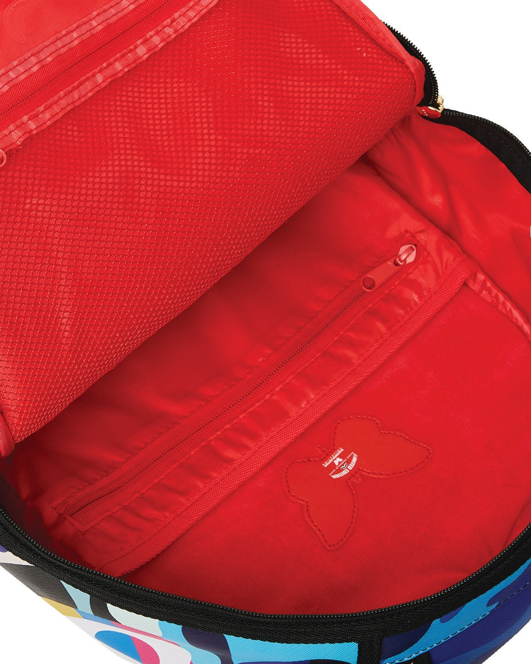 Red Sprayground duffle detail with zipper and butterfly emblem