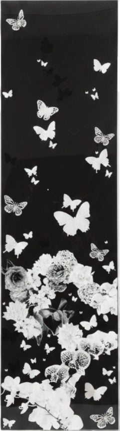 Nocturne, hand-cut white butterflies and flowers on a tall black panel
