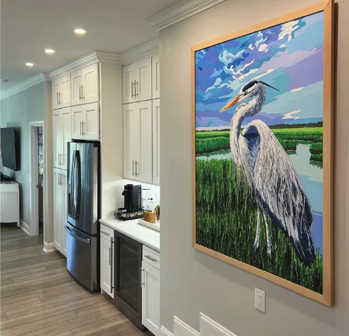Kitchen with a large heron print installation