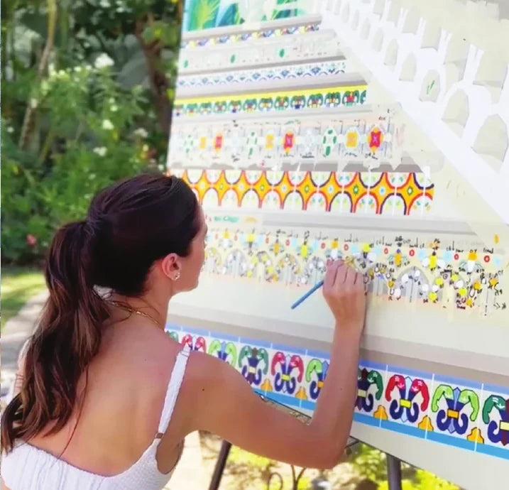 Elizabeth Sutton hand painting a staircase at One&Only Palmilla