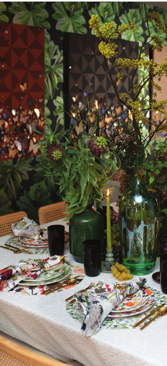 Elizabeth Sutton hand painted tile and wallpaper installation styled with candles and florals