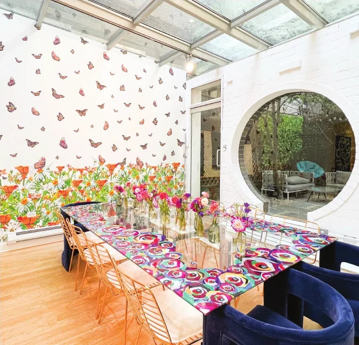 Townhouse dining room with butterfly wallpaper
